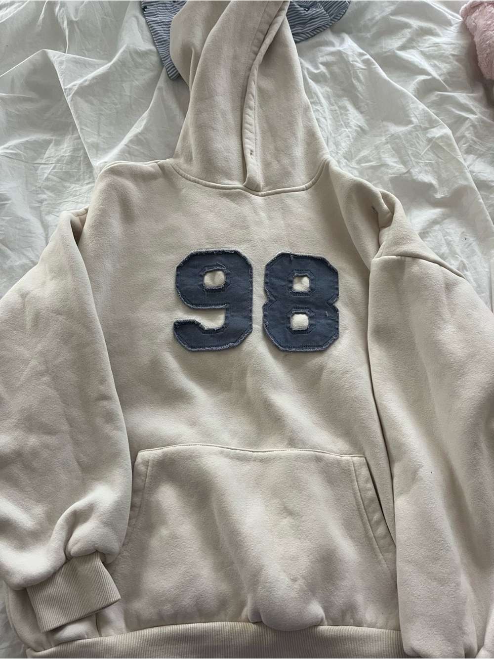 Edikted Cream Hoodie with Pink & Teal Logo Tag